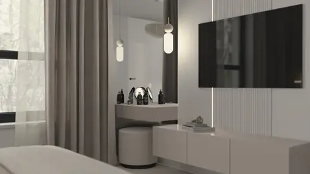 Nowoczesne wnętrze z telewizorem, szafką i dekoracjami w stylu quiet luxury.