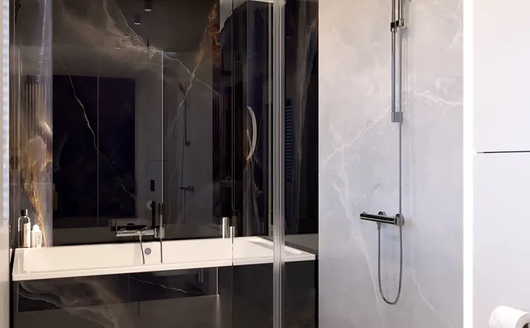 Nowoczesna łazienka z minimalistycznym designem, czarnymi i białymi elementami.