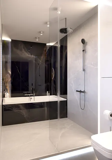 Nowoczesna łazienka z minimalistycznym designem, czarnymi i białymi elementami.