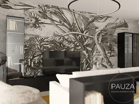 Nowoczesny salon z telewizorem i muralem roślinnym na ścianie.