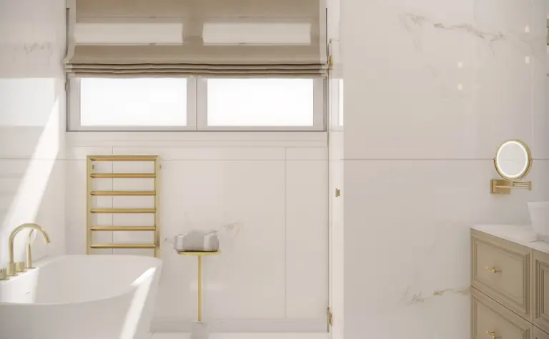 Nowoczesna łazienka z białą wanną i złotymi detalami, styl quiet luxury.