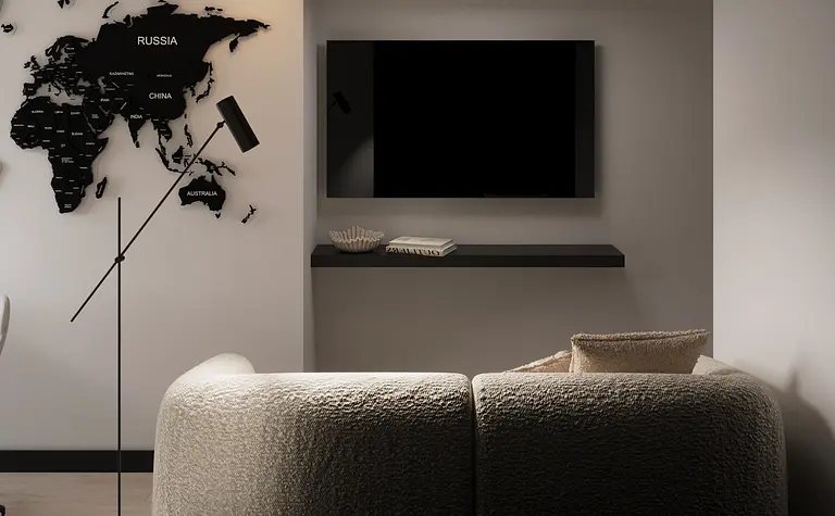 Nowoczesny salon z eklektycznym oświetleniem i minimalistycznym wystrojem.