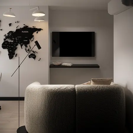 Nowoczesny salon z eklektycznym oświetleniem i minimalistycznym wystrojem.