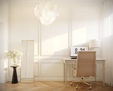 Wnętrze gabinetu z białym biurkiem, lustrem i jasnym oświetleniem w stylu quiet luxury.
