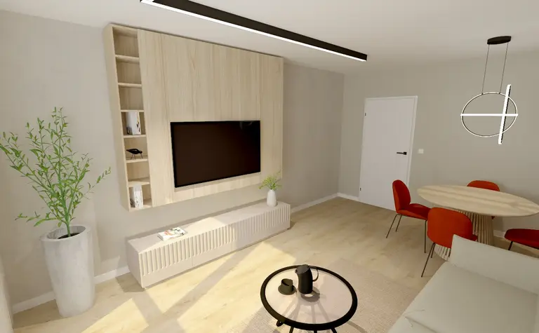 Współczesny salon z drewnianą ścianą, telewizorem, okrągłym stołem i rośliną.