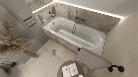 Wnętrze łazienki z wanną, szarymi płytkami i roślinością. Styl glamour i industrialny.