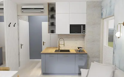 Wnętrze kuchni z szarymi meblami i drewnianym blatem, minimalistyczny design.