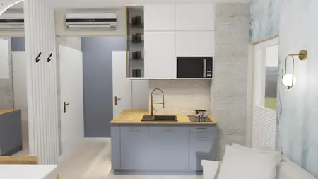Wnętrze kuchni z szarymi meblami i drewnianym blatem, minimalistyczny design.