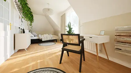 Wnętrze pokoju z biurkiem, roślinami i jasnymi kolorami, styl boho