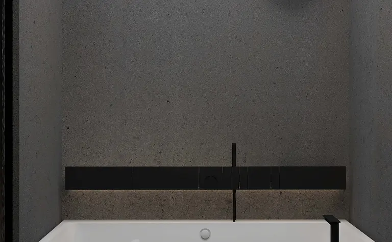 Wnętrze łazienki z betonowymi ścianami i wanną w stylu industrialnym i minimalistycznym.