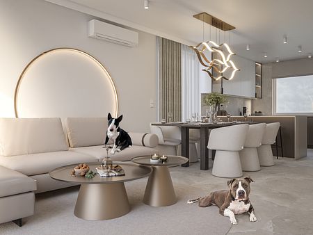 Wnętrze salonu z jasnymi meblami i nowoczesnym oświetleniem, przytulne i funkcjonalne.