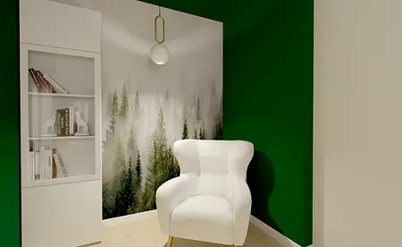 Wnętrze z białym fotelem na tle zielonej ściany i drewnianą podłogą, styl współczesny.