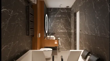 Nowoczesna łazienka z ciemnymi płytkami i drewnianymi elementami, minimalistyczny design.