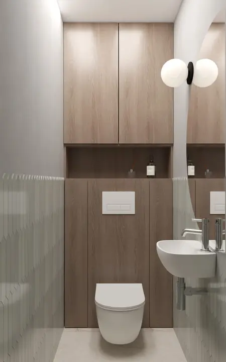 Minimalistyczna toaleta w stylu japandi z drewnianymi akcentami i eleganckim oświetleniem.