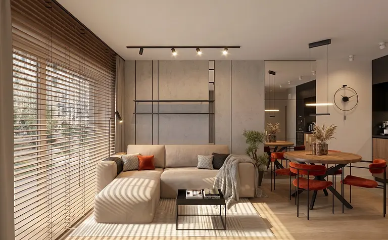 Wnętrze minimalistycznego salonu z beżową sofą, drewnianym stołem i roślinami.