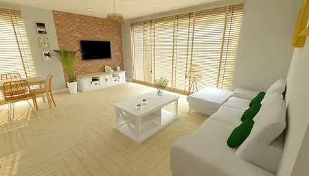 Wnętrze salonu z białą sofą, drewnianym stolikiem i ceglaną ścianą.