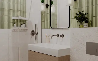 Nowoczesna łazienka w stylu art deco z zielonymi płytkami.