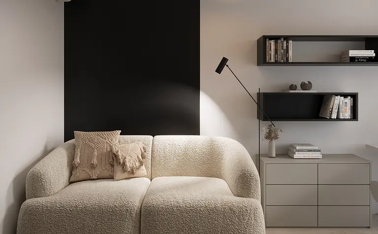 Wnętrze salonu z jasną sofą i czarną ścianą, eklektyczny, glamour, minimalistyczny, nowoczesny.