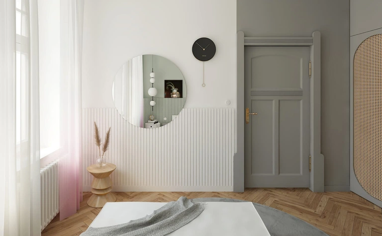 Nowoczesna sypialnia z okrągłym lustrem, szarymi ścianami i drewnianą podłogą. Dopamine decor.