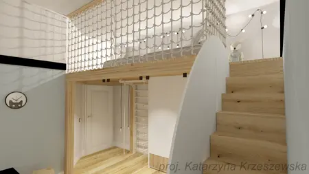 Wnętrze pokoju dziecięcego z drewnianymi schodami i balustradą.