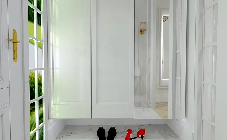 Przedpokój z białymi meblami, złotymi detalami i nowoczesnymi drzwiami.