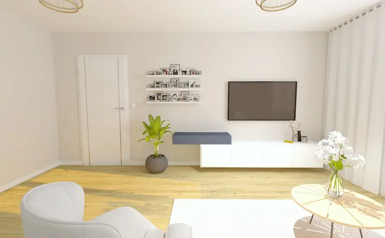 Współczesny salon z białą szafką, telewizorem i rośliną.