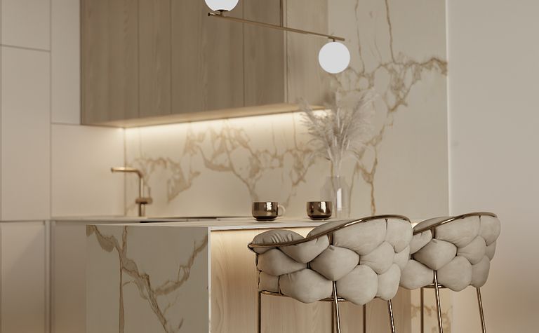 Nowoczesna kuchnia z drewnianymi meblami i białym blatem, oświetleniem i stołkami barowymi.