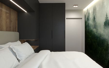 Sypialnia w stylu minimalistycznym z jasnym łóżkiem, drewnianą ścianą i nowoczesnym oświetleniem.