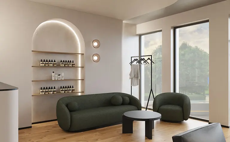 Wnętrze z boho i japandi, zielona sofa, drewniane akcenty.