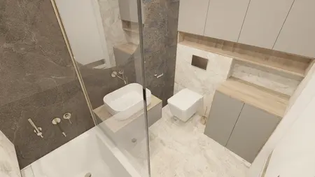 Wnętrze łazienki z białą umywalką, szarymi meblami i marmurowymi akcentami.
