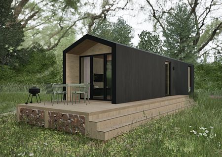 Domek z tarasem w stylu dopamine decor, otoczony zielenią.