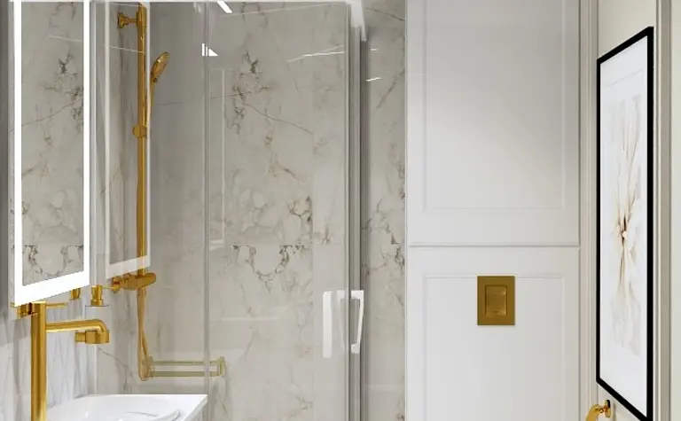 Nowoczesna łazienka w stylu glamour z białymi meblami i złotymi detalami.
