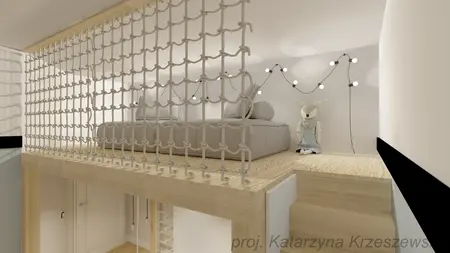 Wnętrze poddasza z jasnym wystrojem i meblami, idealne dla dzieci.