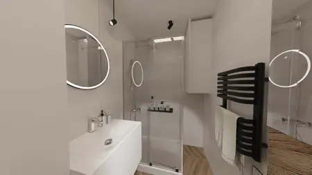 Nowoczesna łazienka z prysznicem, umywalką i minimalistycznymi akcentami.