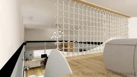 Wnętrze poddasza z białymi ścianami, drewnianą podłogą i nowoczesnym oświetleniem.
