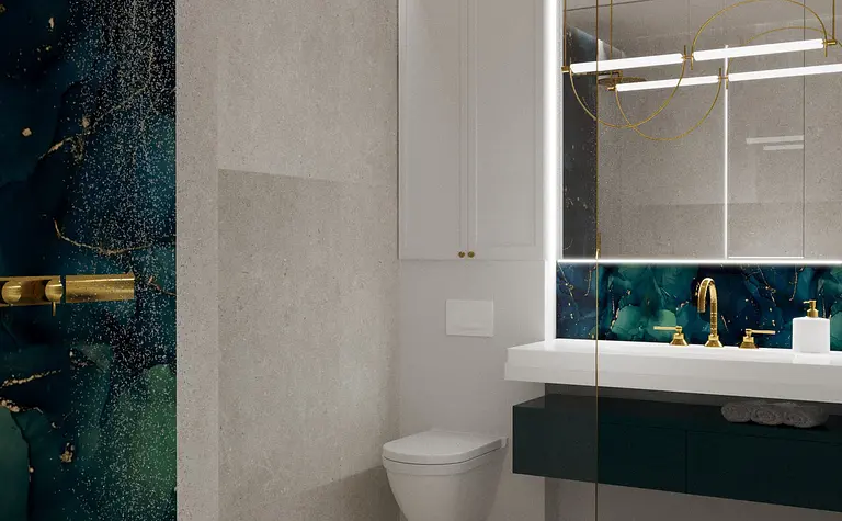 Nowoczesna łazienka z niebieską ścianą, złotymi detalami i minimalistycznym designem glamour.
