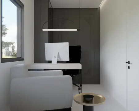 Gabinet minimalistyczny z biurkiem, krzesłem i oknem.