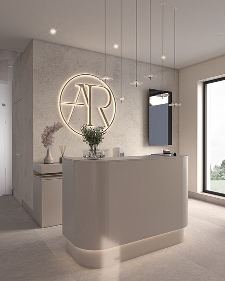 Nowoczesna recepcja z minimalistycznym blatem, oświetleniem i dekoracjami.