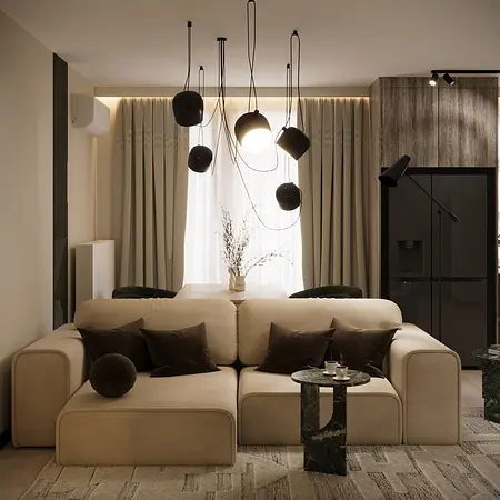 Wnętrze salonu w stylu eklektycznym z beżową sofą, czarnymi lampami i minimalistycznymi akcentami.