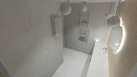 Minimalistyczna łazienka w stylu nowoczesnym i skandynawskim z szarymi ścianami.