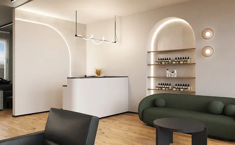 Wnętrze biura w stylu boho i japandi z białym biurkiem i zieloną sofą.