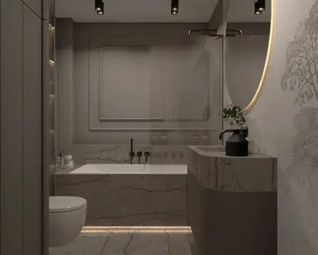Nowoczesna łazienka z wanną, umywalką i eleganckimi akcentami.