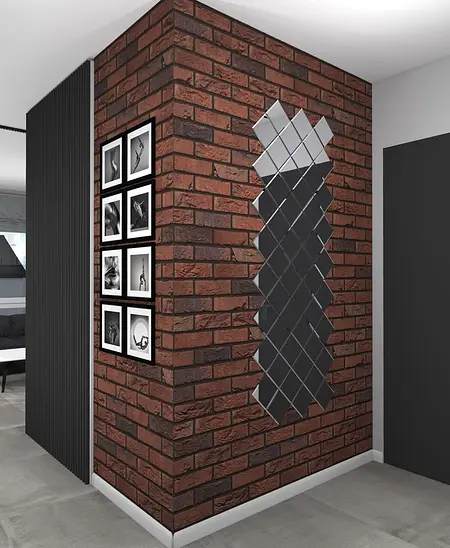Korytarz z ceglanym murem, lustrami i zdjęciami w stylu art deco, industrialnym i minimalistycznym.