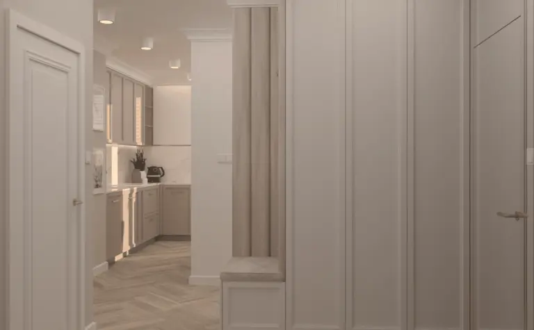 Wnętrze nowoczesnej kuchni w stylu quiet luxury z beżowymi meblami.