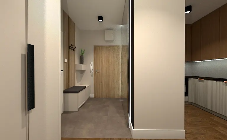Wnętrze nowoczesnego przedpokoju z beżowymi ścianami i drewnianymi detalami.