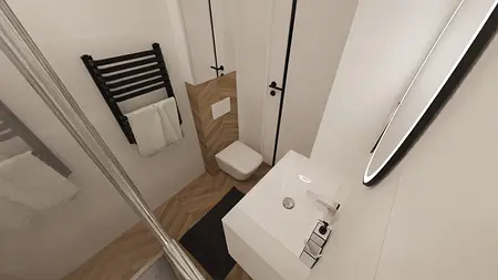 Nowoczesna łazienka z minimalistycznym wystrojem, białą umywalką i drewnianą podłogą.