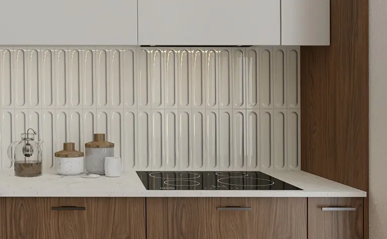 Współczesna kuchnia z białymi meblami i drewnianym blatem.