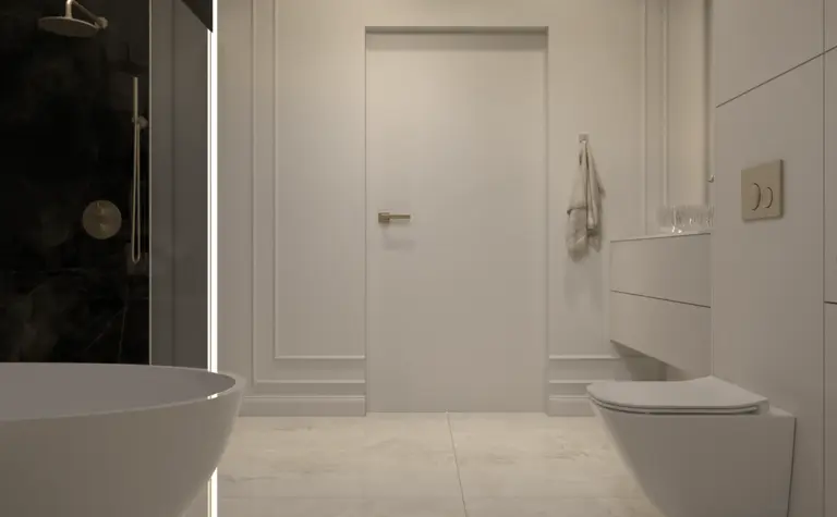 Nowoczesna łazienka z białą wanną, czarną kabiną prysznicową, eleganckimi detalami glamour.