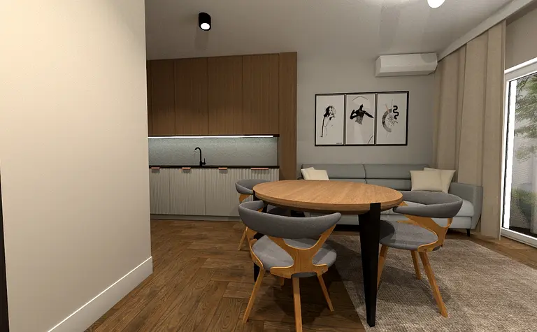 Współczesna kuchnia z drewnianym stołem i szarymi meblami, jasne wnętrze.