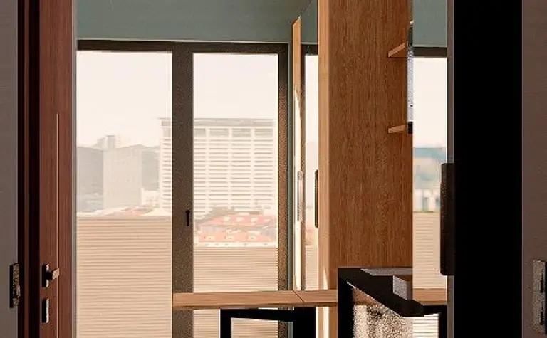 Wnętrze kuchni z minimalistycznym designem, nowoczesnymi meblami i współczesnymi detalami.